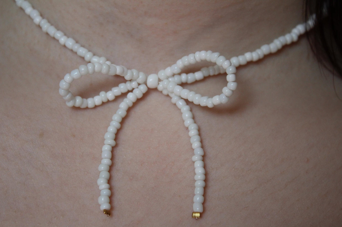 beaded bow necklace