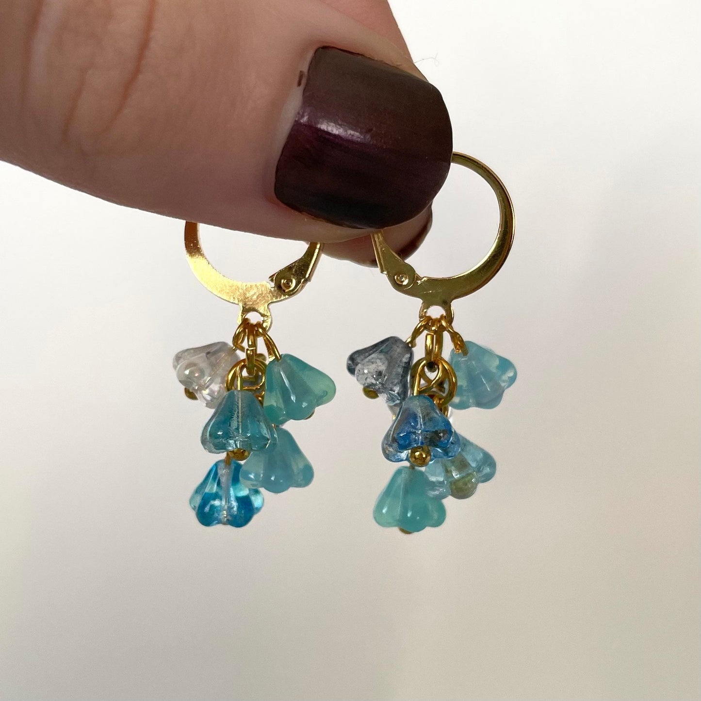 Dainty blue flower bunch huggie hoop earrings