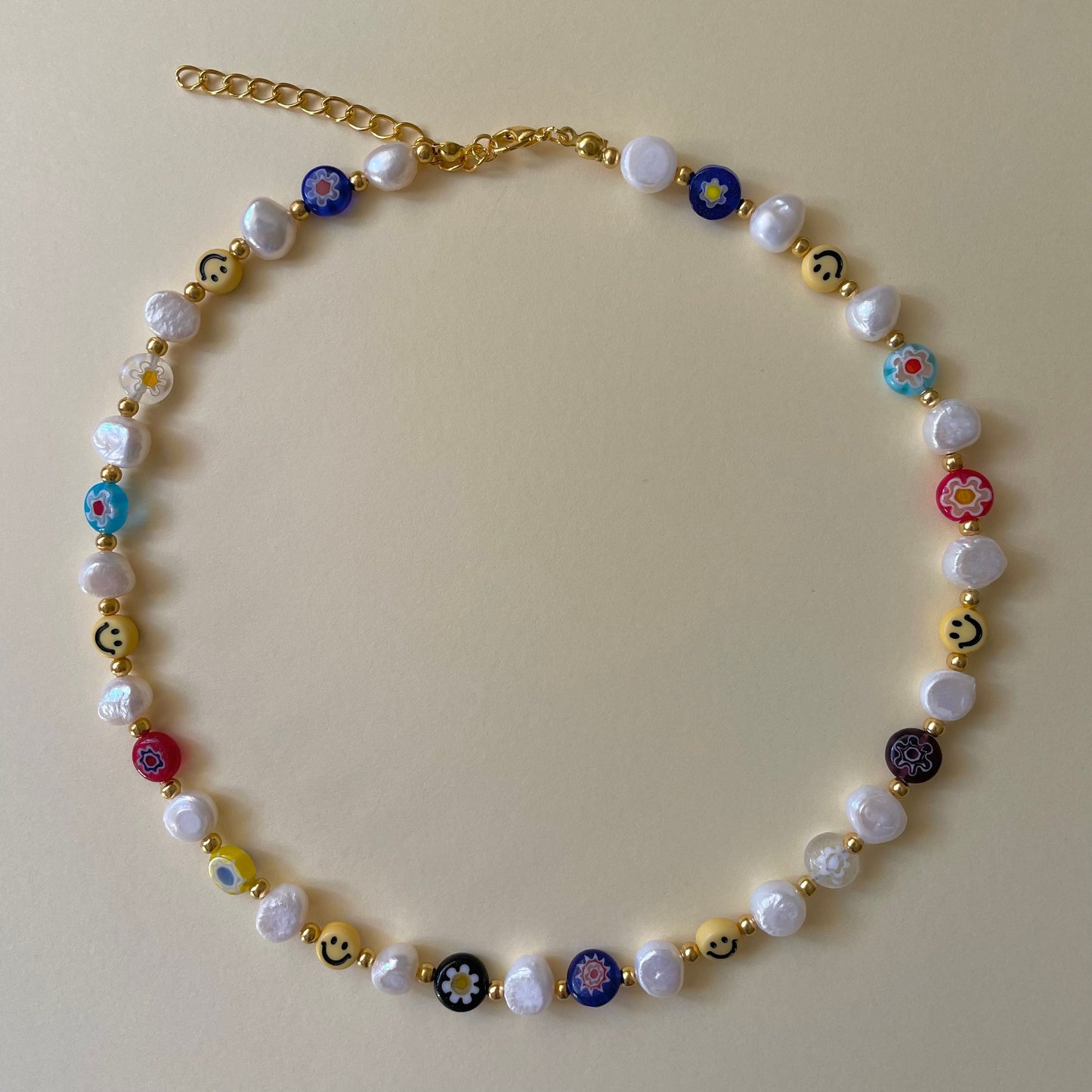 Freshwater pearl gold millefiori smiley necklace