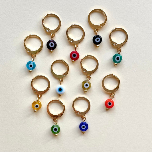 Small evil eye gold huggie hoop earrings